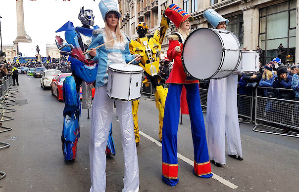 drumming stilt walkers london